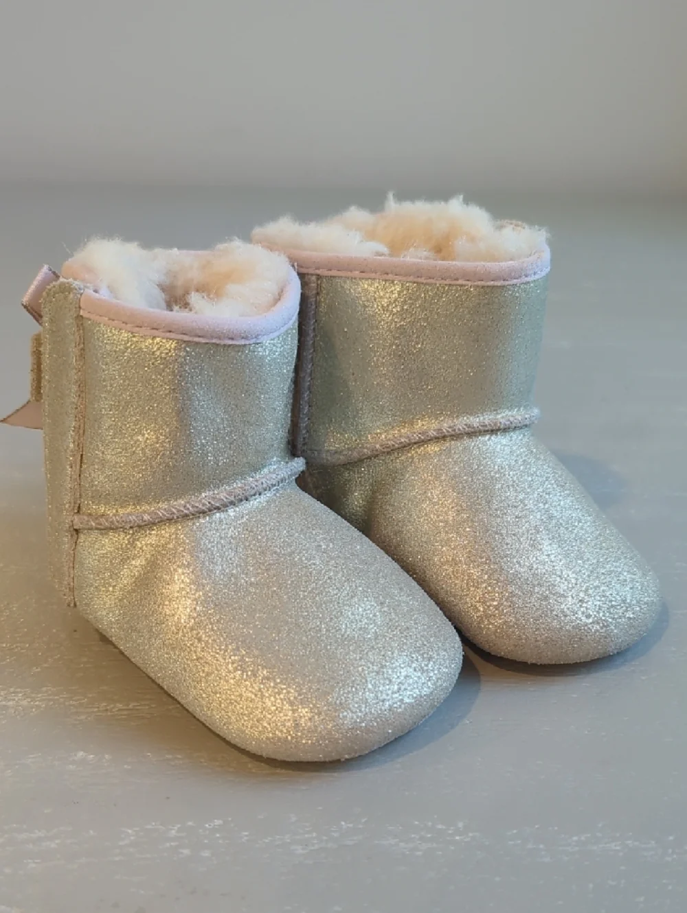 UGG Metallic Gold Baby Booties‎ with Pink Bows